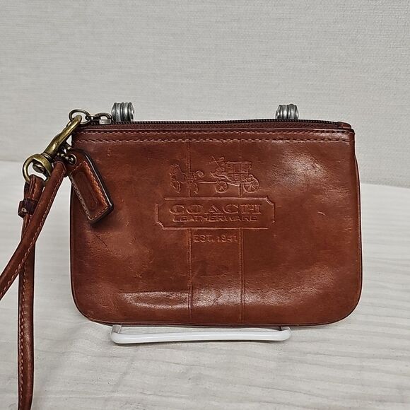Coach Handbags - COACH LEATHER HORSE AND CARRIAGE EMBOSSED WRISTLET BFPM-02-247